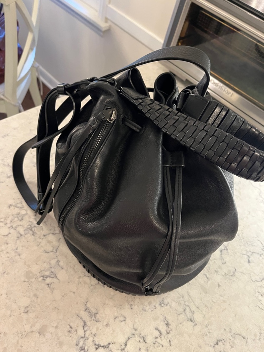 Supple Black Leather Bucket Bag with Woven Handle